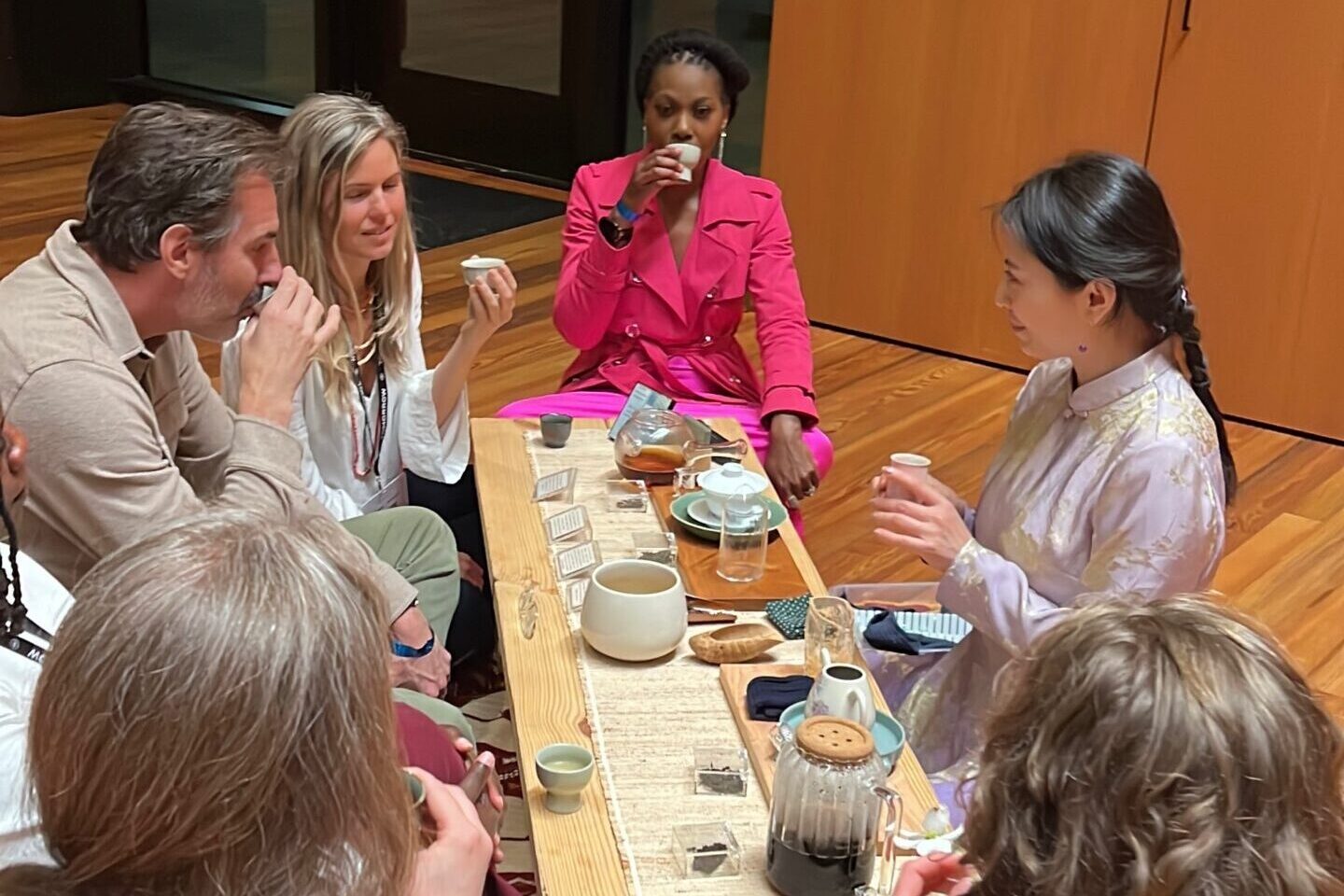 Guests enjoying a tea lounge hosted by Upon a Tea at the Tom Tom Festival opening event