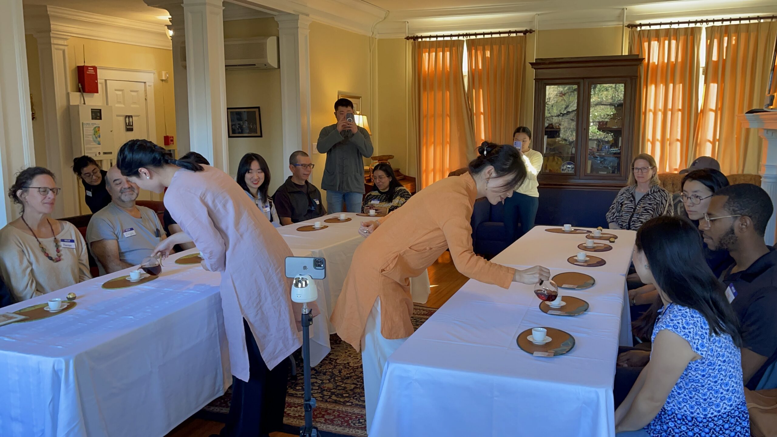 Guests attending a Chinese tea tasting hosted by Upon a Tea at the University of Virginia